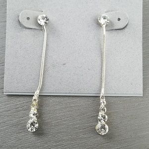 Dangling, shiny earrings